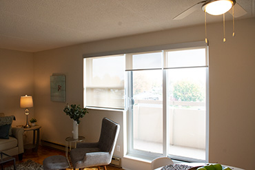 Three pull-down roller blind panels in a single Anodized Silver casing.